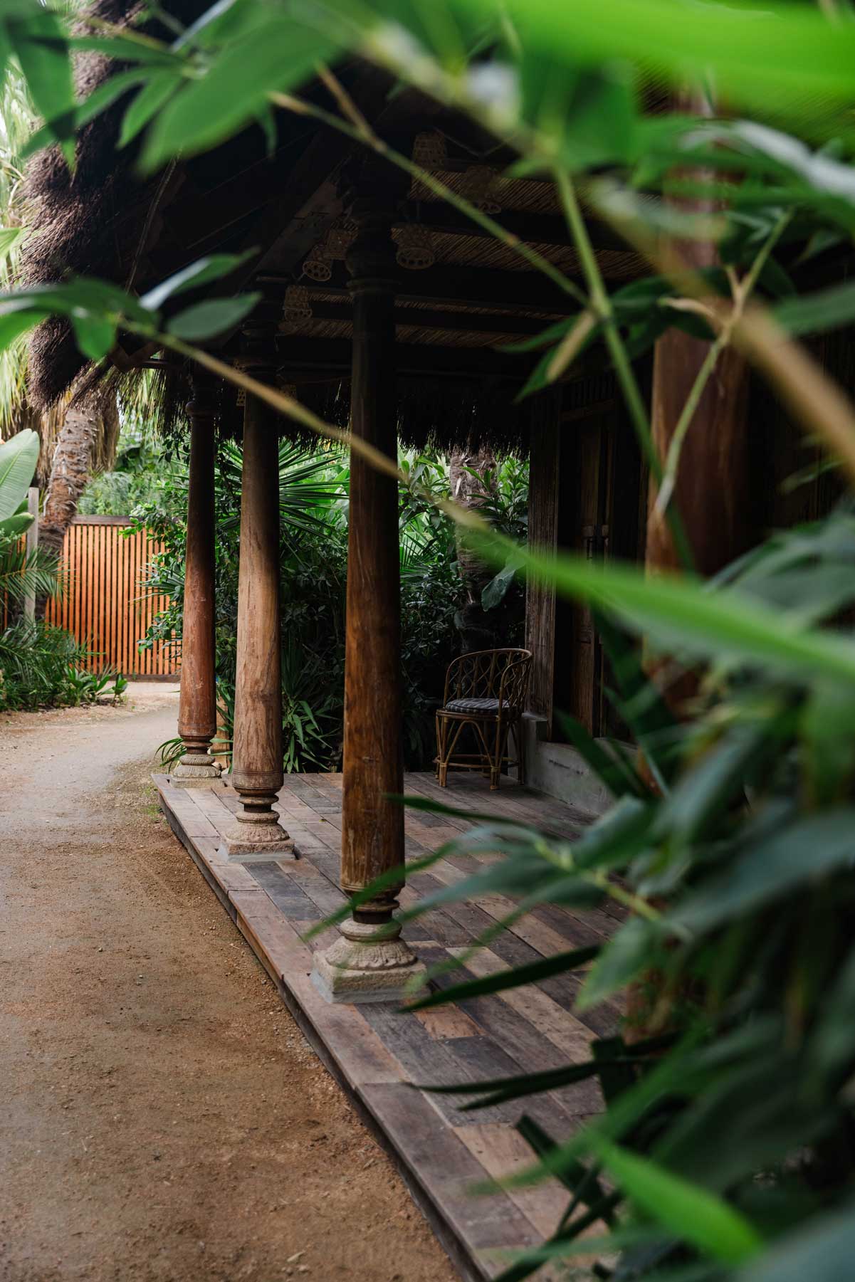 Tropical veranda with wooden columns
